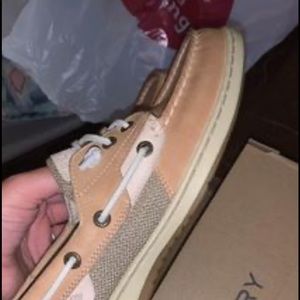 Size 9 womens sperrys brand new in box NEVER WORN. Too tight for me.